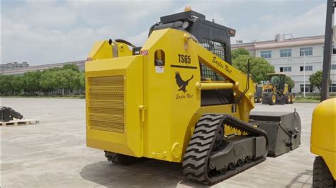 TS65 skid steer loader and its attachments 